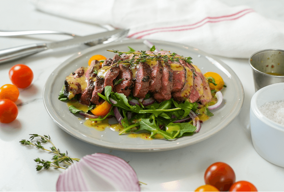 Macreuse moutarde et miel sur salade de roquette